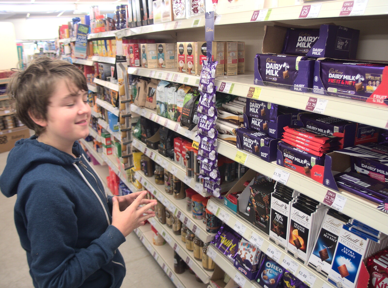 Fred considers some chocolate from Christmas Shopping in Norwich, Norfolk - 21st December 2022