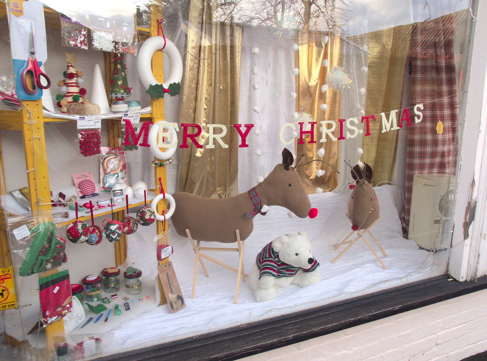 The Fabric Shop has a Christmas display in the window from Christmas Shopping in Norwich, Norfolk - 21st December 2022
