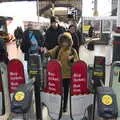 Harry exits through the barriers at Norwich, Christmas Shopping in Norwich, Norfolk - 21st December 2022