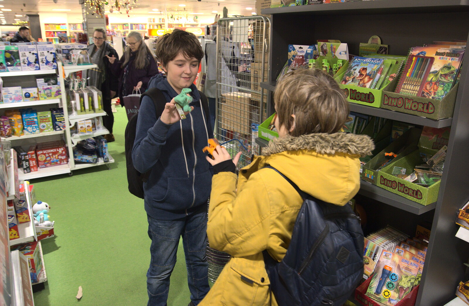 Fred and Harry have a dinosaur finger-puppet fight from Christmas Shopping in Norwich, Norfolk - 21st December 2022