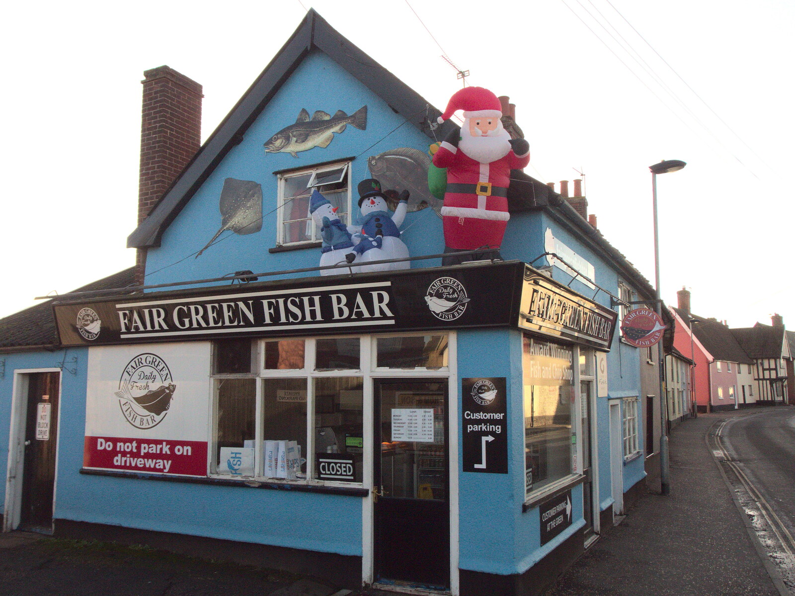 A Wander around Fair Green, Diss, Norfolk - 11th January 2023: Fair Green fish bar still has Christmas going on
