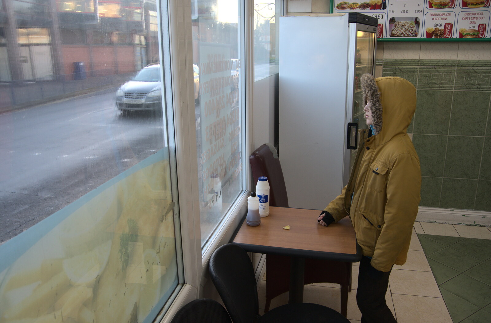 A Short Trip to Felixstowe, Suffolk - 22nd January 2023: Harry looks out of the chip-shop window
