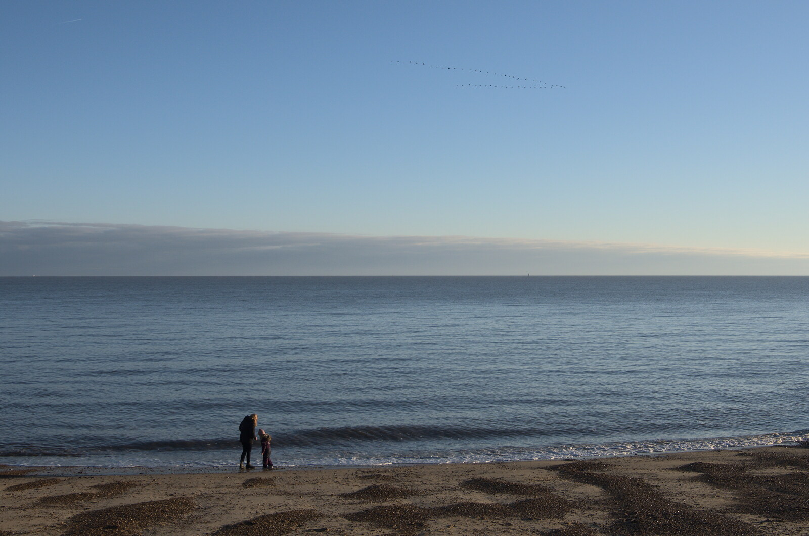 A Short Trip to Felixstowe, Suffolk - 22nd January 2023: Two people on an otherwise-empty beach