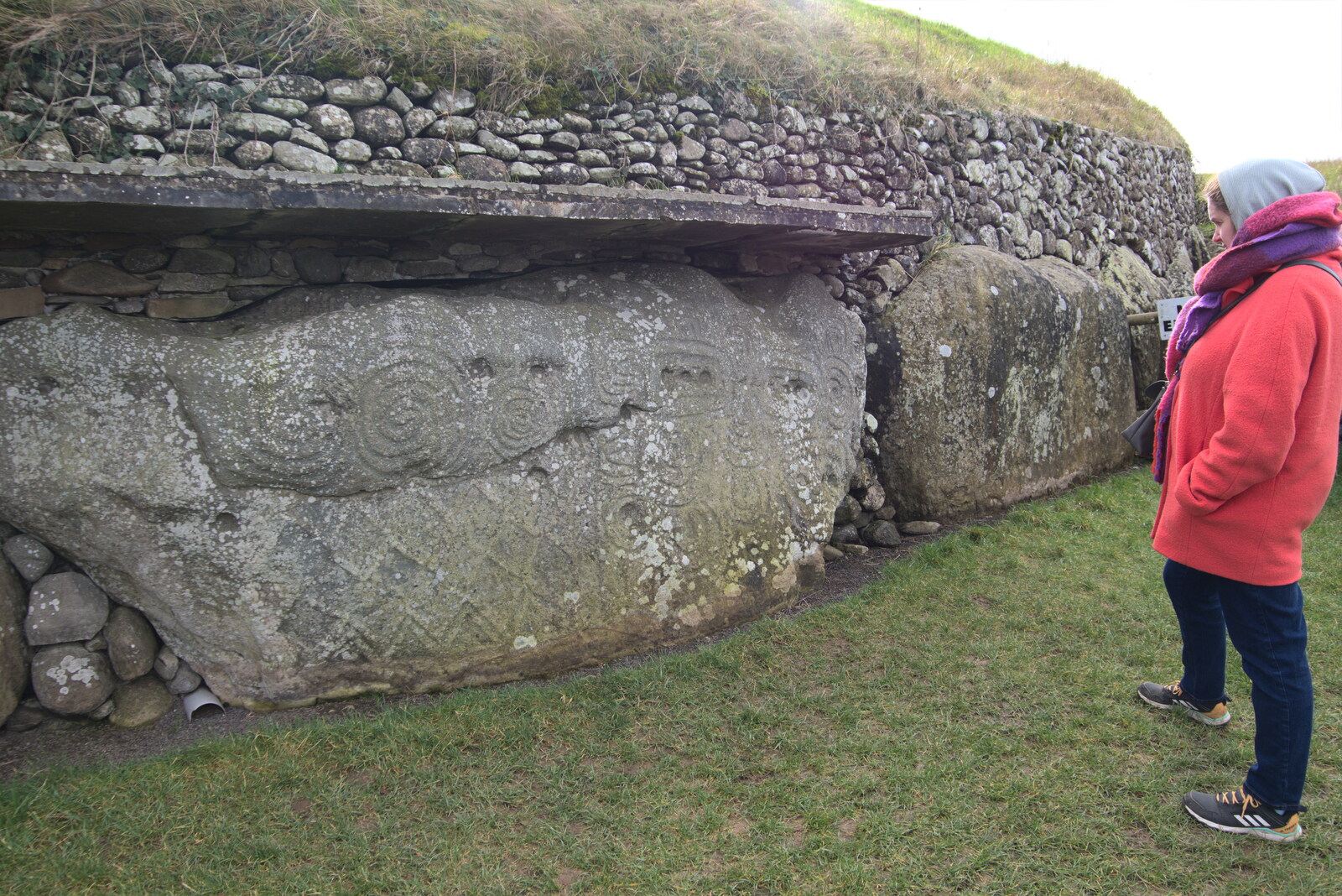Blackrock North and Newgrange, County Louth, Ireland - 16th February 2023: Isobel surveys some neolithic art