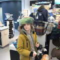 Harry tests a hat out in the gift shop, Blackrock North and Newgrange, County Louth, Ireland - 16th February 2023