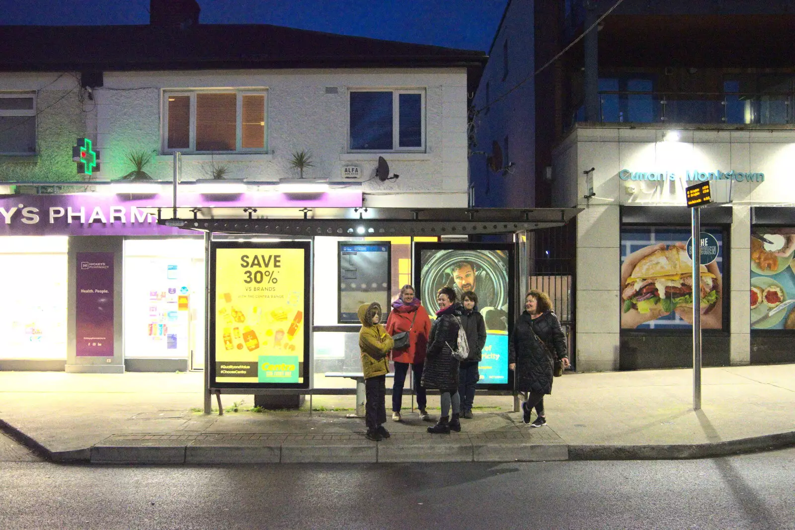 We wait at the bus stop on Monkstown Farm , from Blackrock North and Newgrange, County Louth, Ireland - 16th February 2023