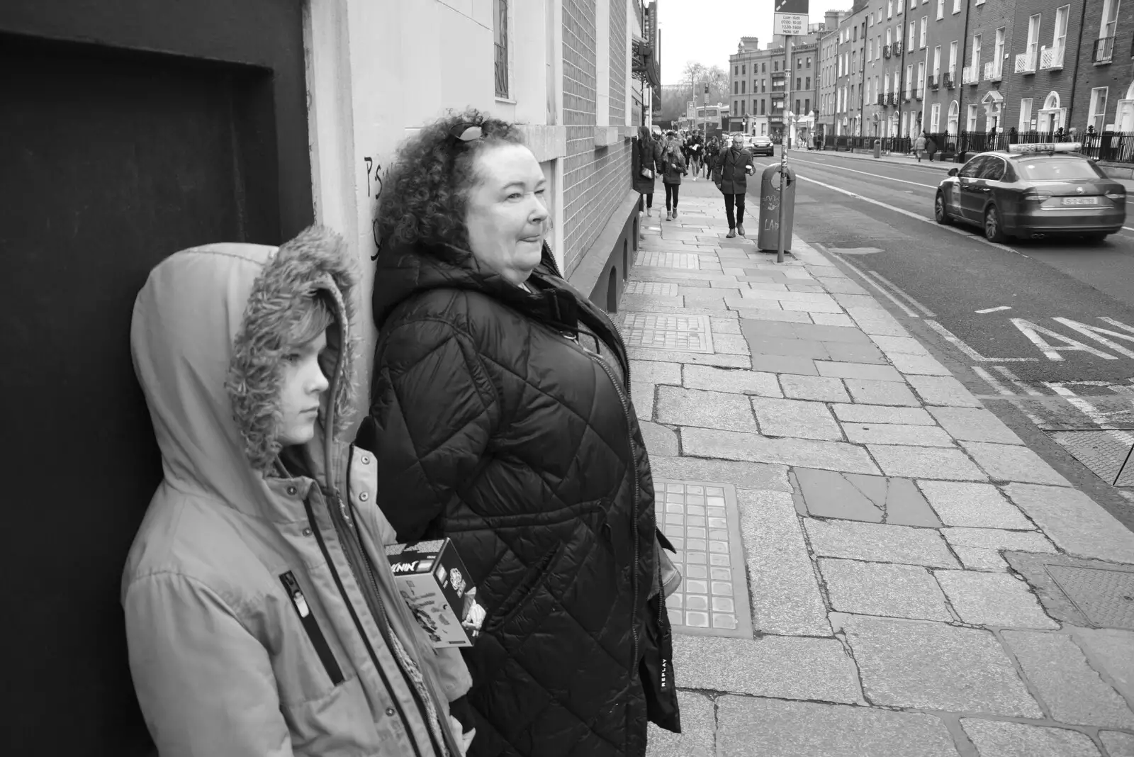 Harry and Louise wait on Clare Street, from The Dead Zoo, Dublin, Ireland - 17th February 2023