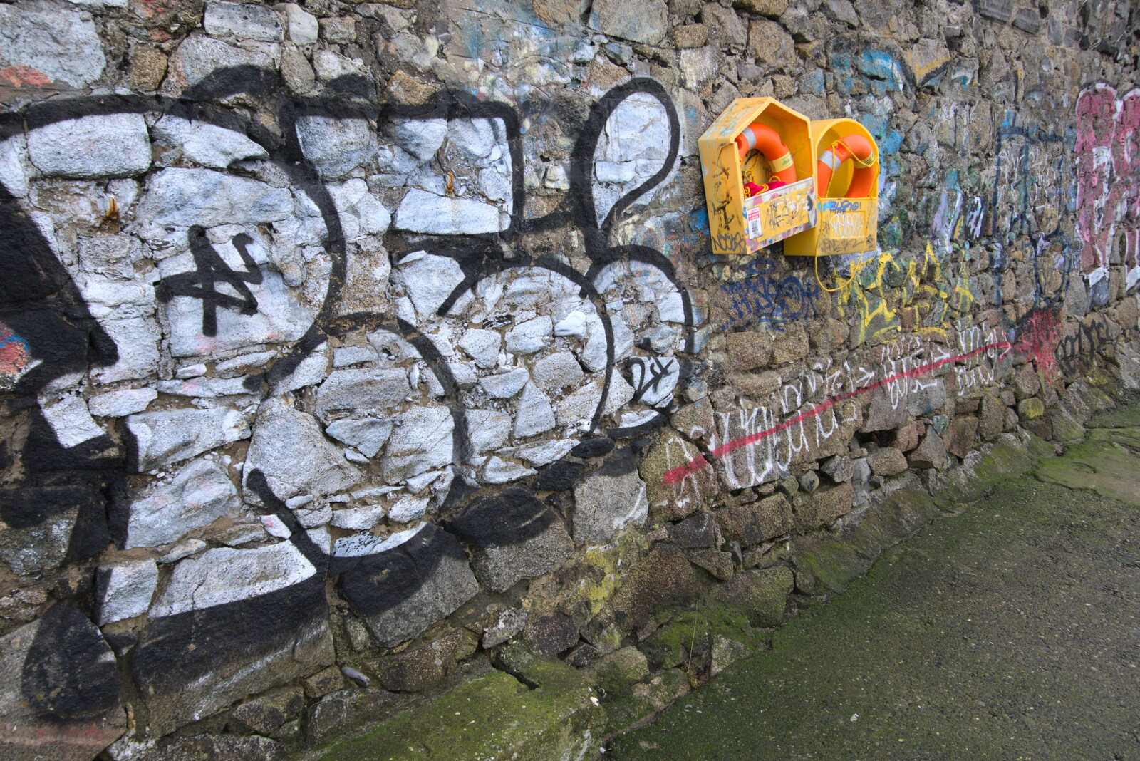 The End of the Breffni, Blackrock, Dublin - 18th February 2023: Graffiti on the sea wall