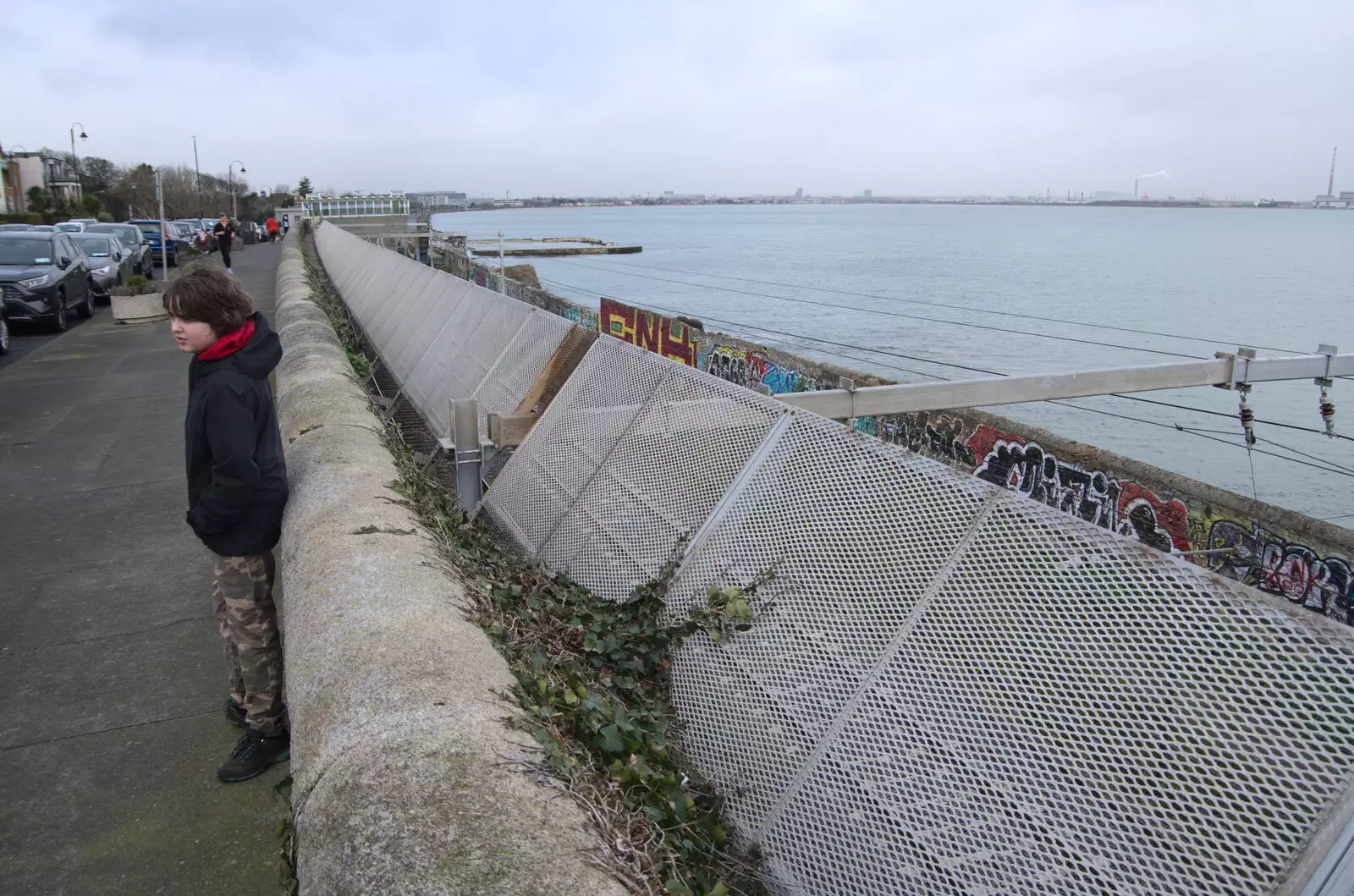 Fred leans on the wall on Idrone Terrace, from The End of the Breffni, Blackrock, Dublin - 18th February 2023
