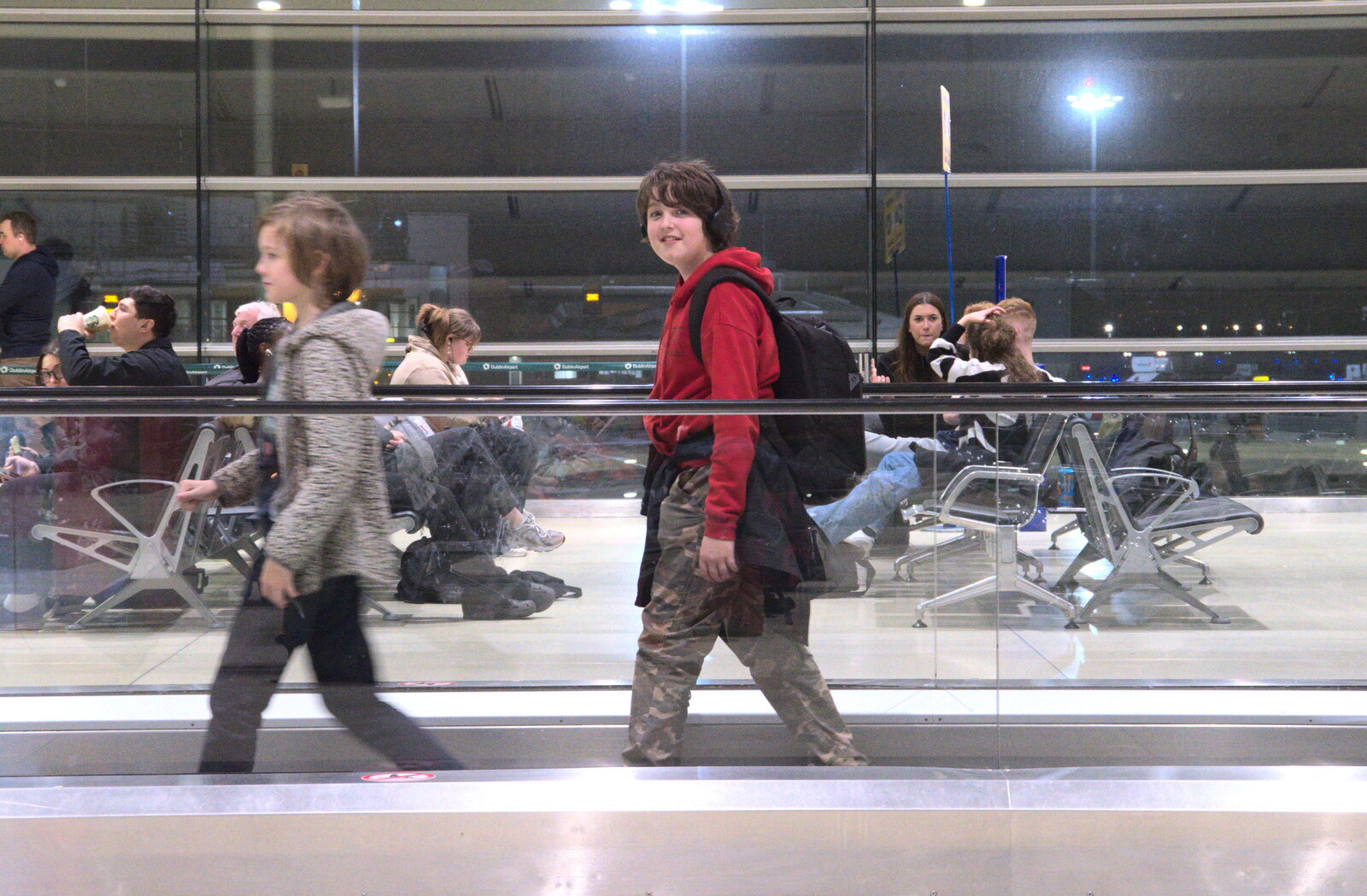 Harry and Fred go backwards on the travelator from The End of the Breffni, Blackrock, Dublin - 18th February 2023
