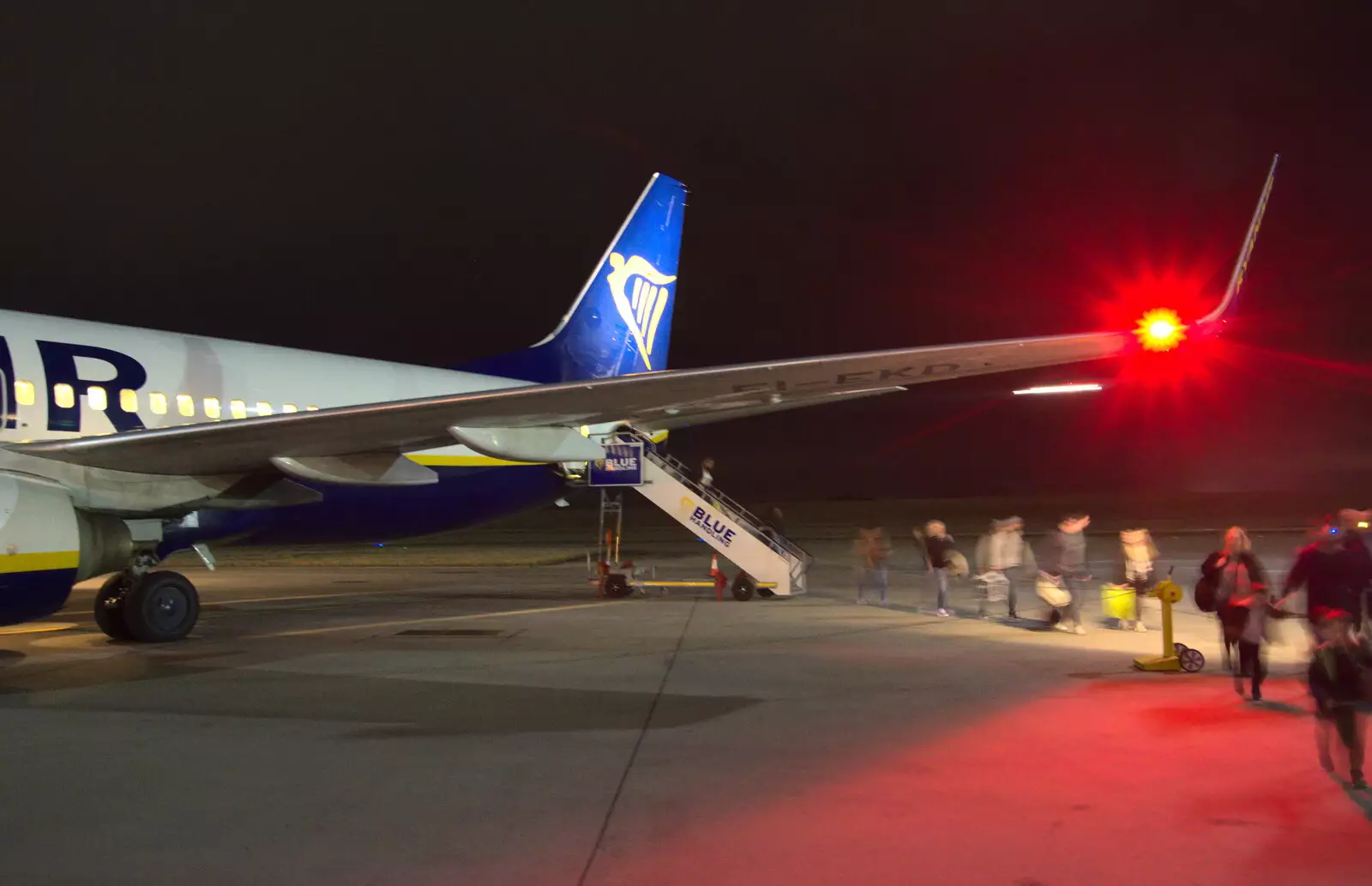 A stream of passengers disembarks the plane, from The End of the Breffni, Blackrock, Dublin - 18th February 2023