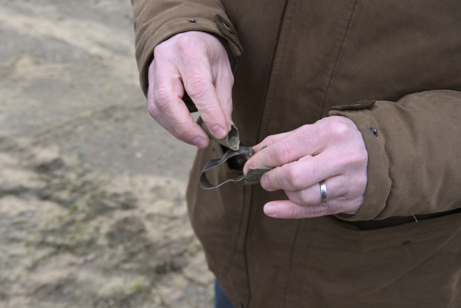 The Detectorists, and a Trip to the Market, Norwich - 25th February 2023: Clive finds a stainless steel clip from the plane