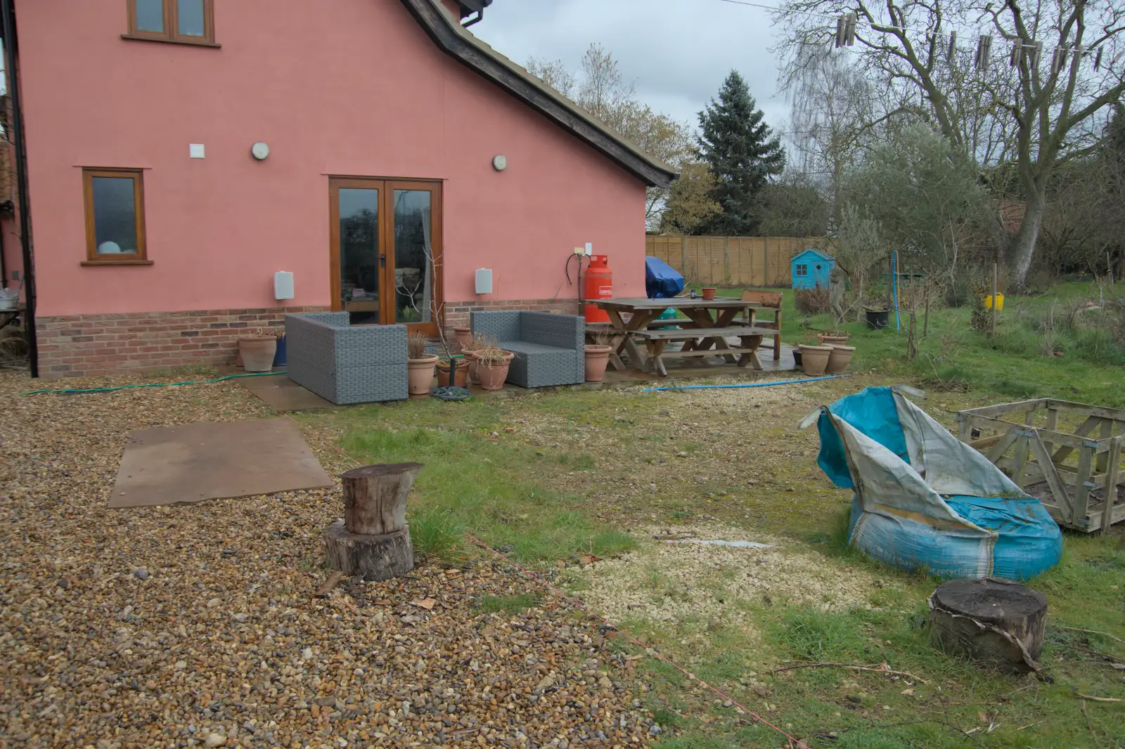 The patio area is in a bit of a state, from A Short Walk in the Woods, Eye, Suffolk - 4th March 2023