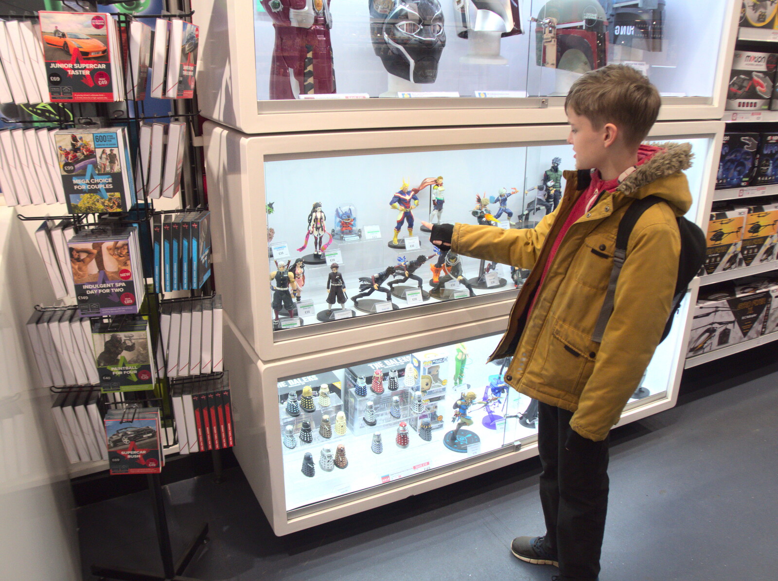 Harry points at some action figures in MenKind from It's a Stitch Up: A Trip to Norwich, Norfolk - 18th March 2023