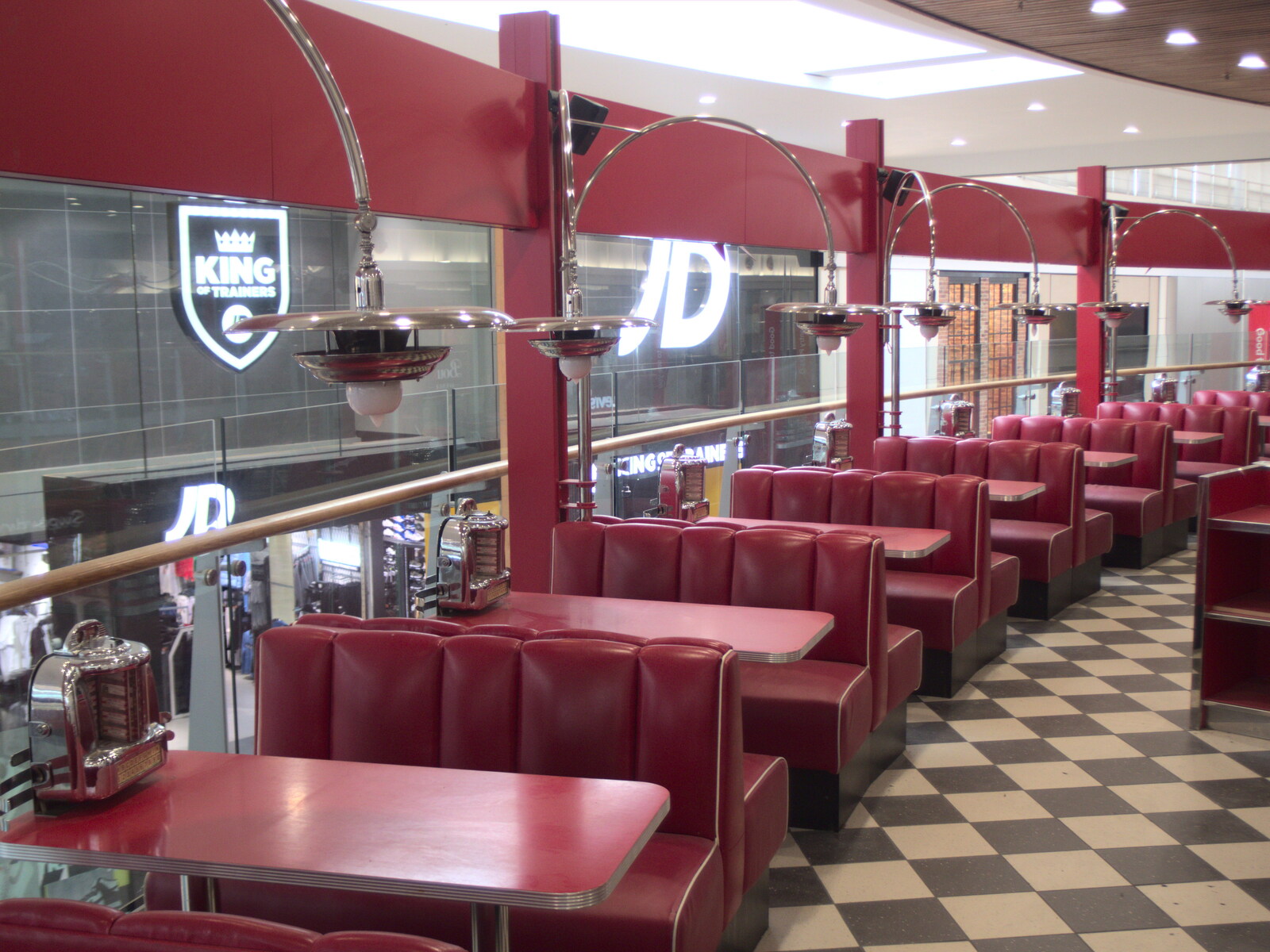 A line of red faux-leather diner booths from Dolphin House Fire and an Escape Room, Diss and Norwich - 26th March 2023