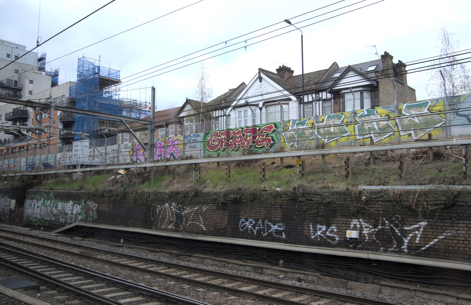 Graffiti by the trackside near Seven Sisters from A Day in New Milton, Hampshire - 3rd April 2023