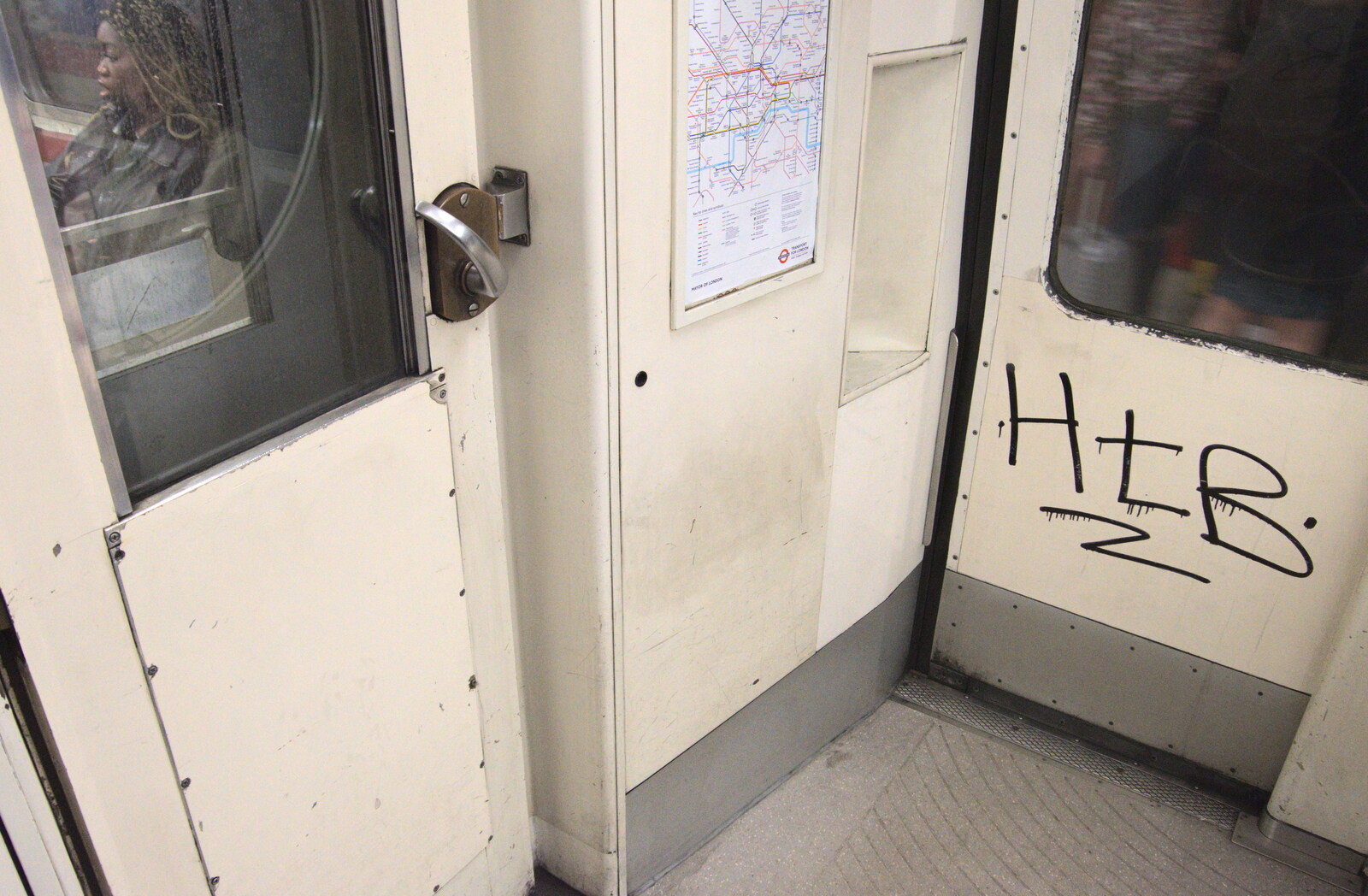 Graffiti on the door of an old tube train from A Day in New Milton, Hampshire - 3rd April 2023