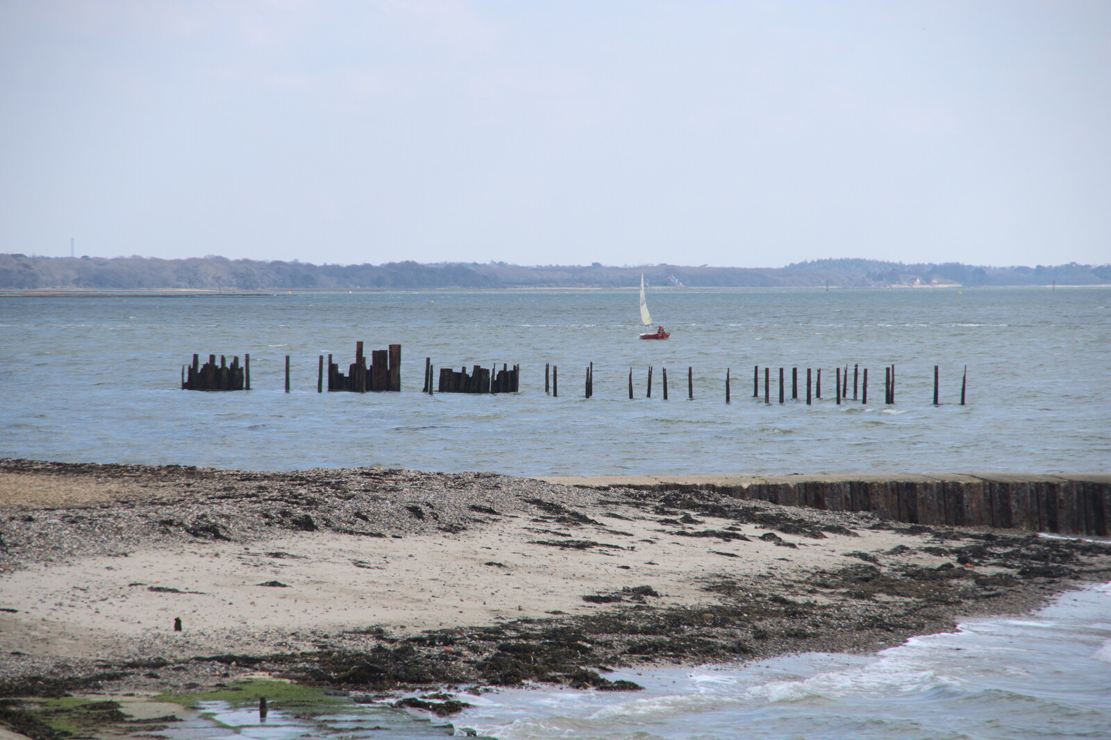 A small dinghy scuds about on the Solent from A Day in New Milton, Hampshire - 3rd April 2023