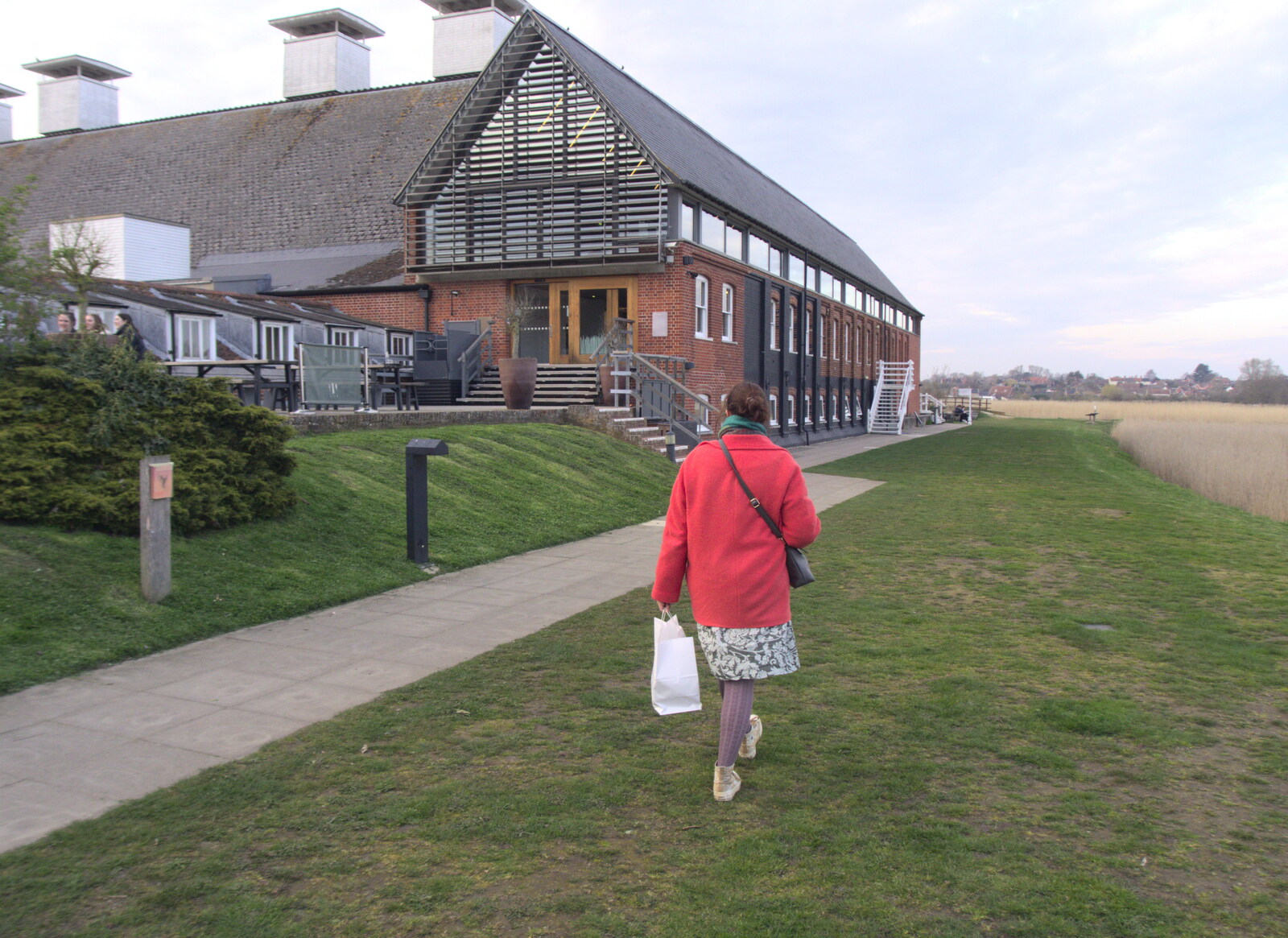 Isobel roams around with a bag of food from Fred and the Orchestra, Snape Maltings, Suffolk - 5th April