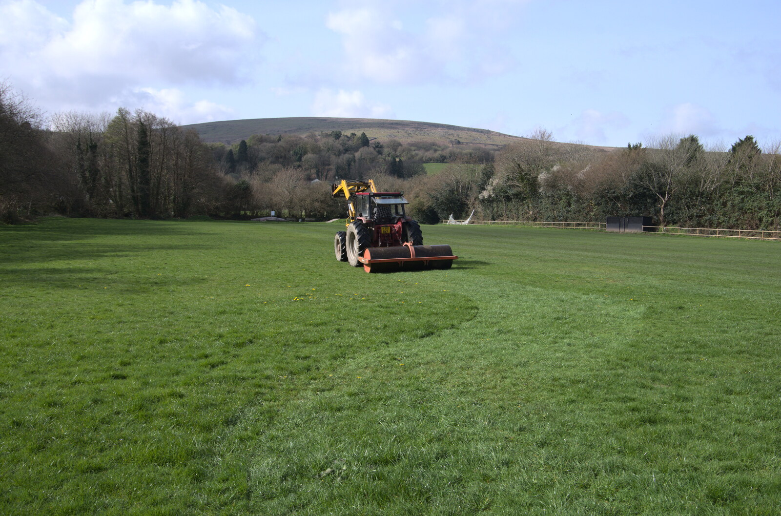 The recreation ground gets rolled from Easter in South Zeal and Moretonhampstead, Devon - 9th April
