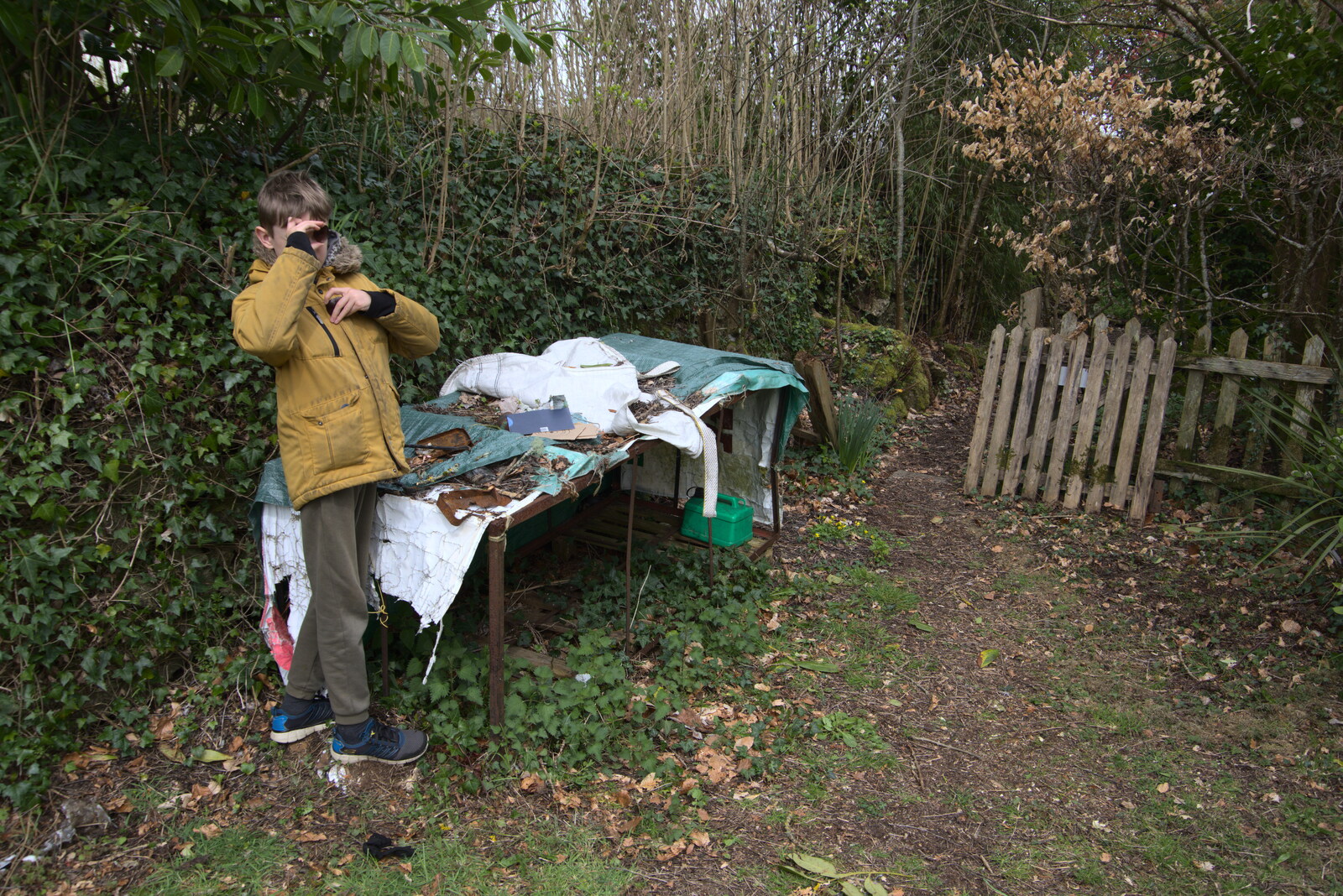 Harry pokes around with stuff in the garden from Easter in South Zeal and Moretonhampstead, Devon - 9th April