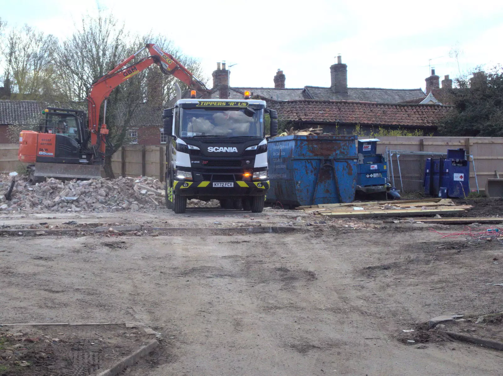 Rubble is dumped into a tipper for disposal, from Paddock House Demolition and the BSCC at Thorndon, Suffolk - 13th April 2023