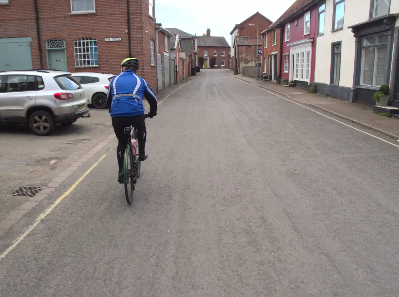 Gaz cycles up Cross Street in Eye, from Paddock House Demolition and the BSCC at Thorndon, Suffolk - 13th April 2023