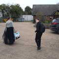 Isobel and Fred head into the community centre, Palgrave Players and Weybread Canoes, Harleston - 16th April 2023