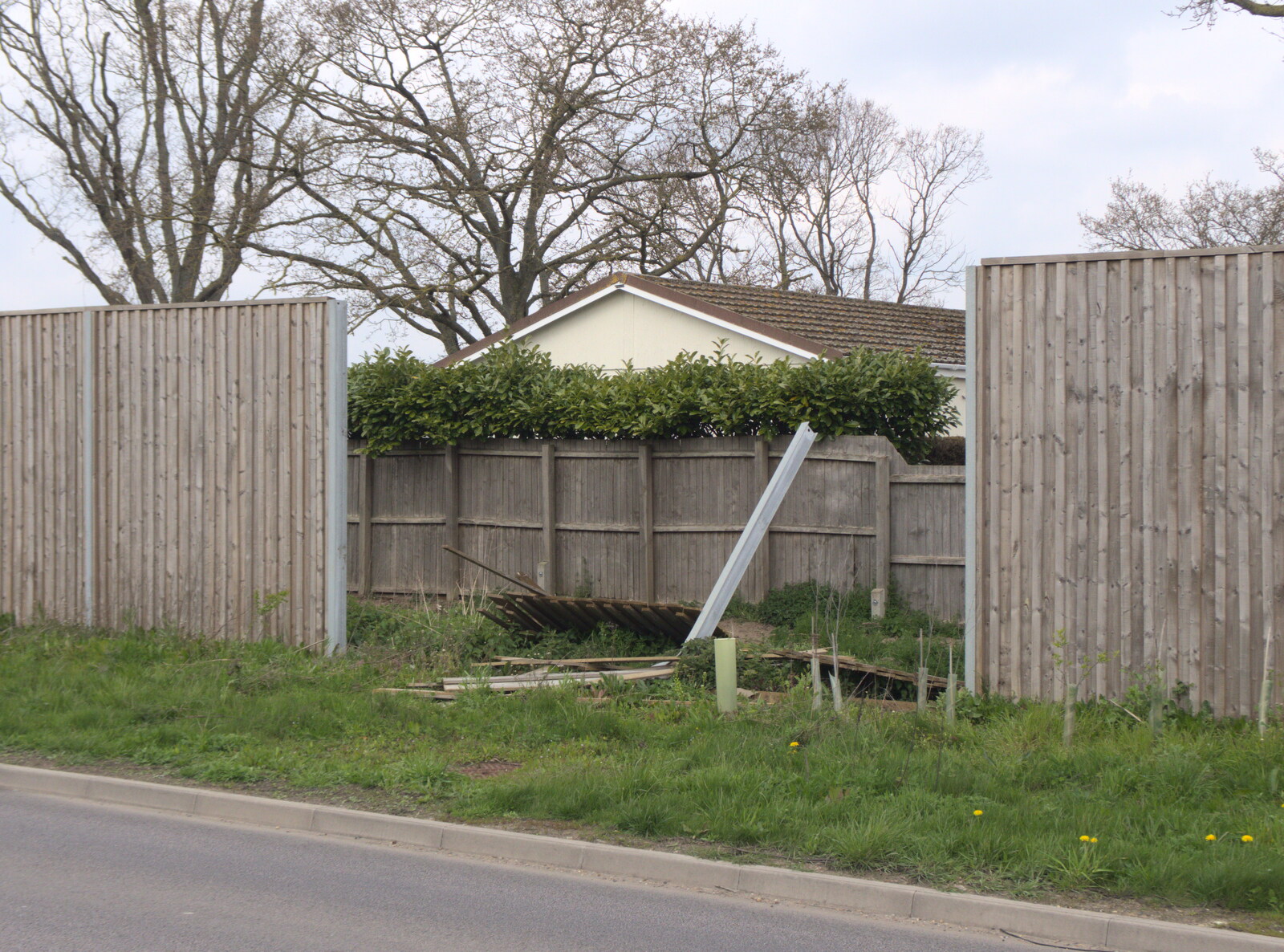 Someone has twatted the sound-proof fence from Bike Rides and a Visit to the Farm Shop, Eye, Suffolk -  25th April 2023