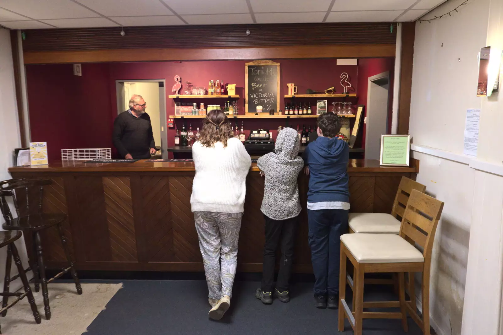 Isobel, Harry and Fred are at the bar, from Pizza at the Village Hall, Brome, Suffolk - 30th April 2023