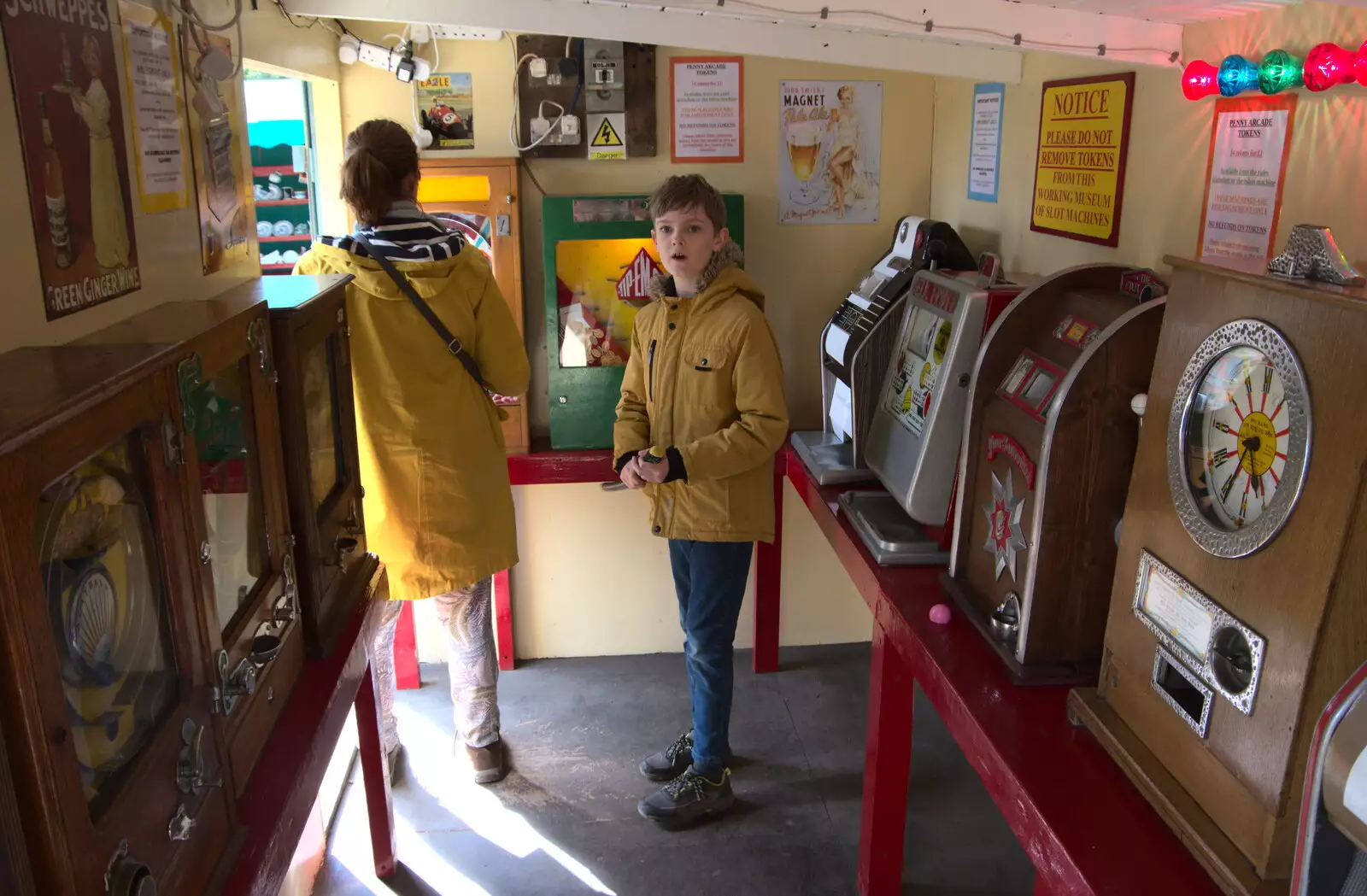 Isobel and Harry do the old-time penny arcade, from The Heritage Steam Gala, Bressingham Steam Museum, Norfolk - 1st May 2023