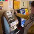 Isobel has a go on a Mills penny one-armed bandit, The Heritage Steam Gala, Bressingham Steam Museum, Norfolk - 1st May 2023