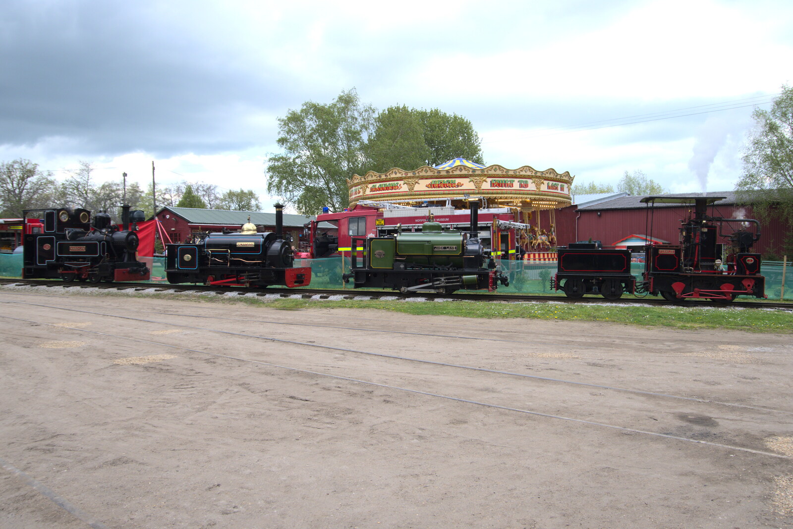 All four narrow-guage engines are lined up from The Heritage Steam Gala, Bressingham Steam Museum, Norfolk - 1st May 2023