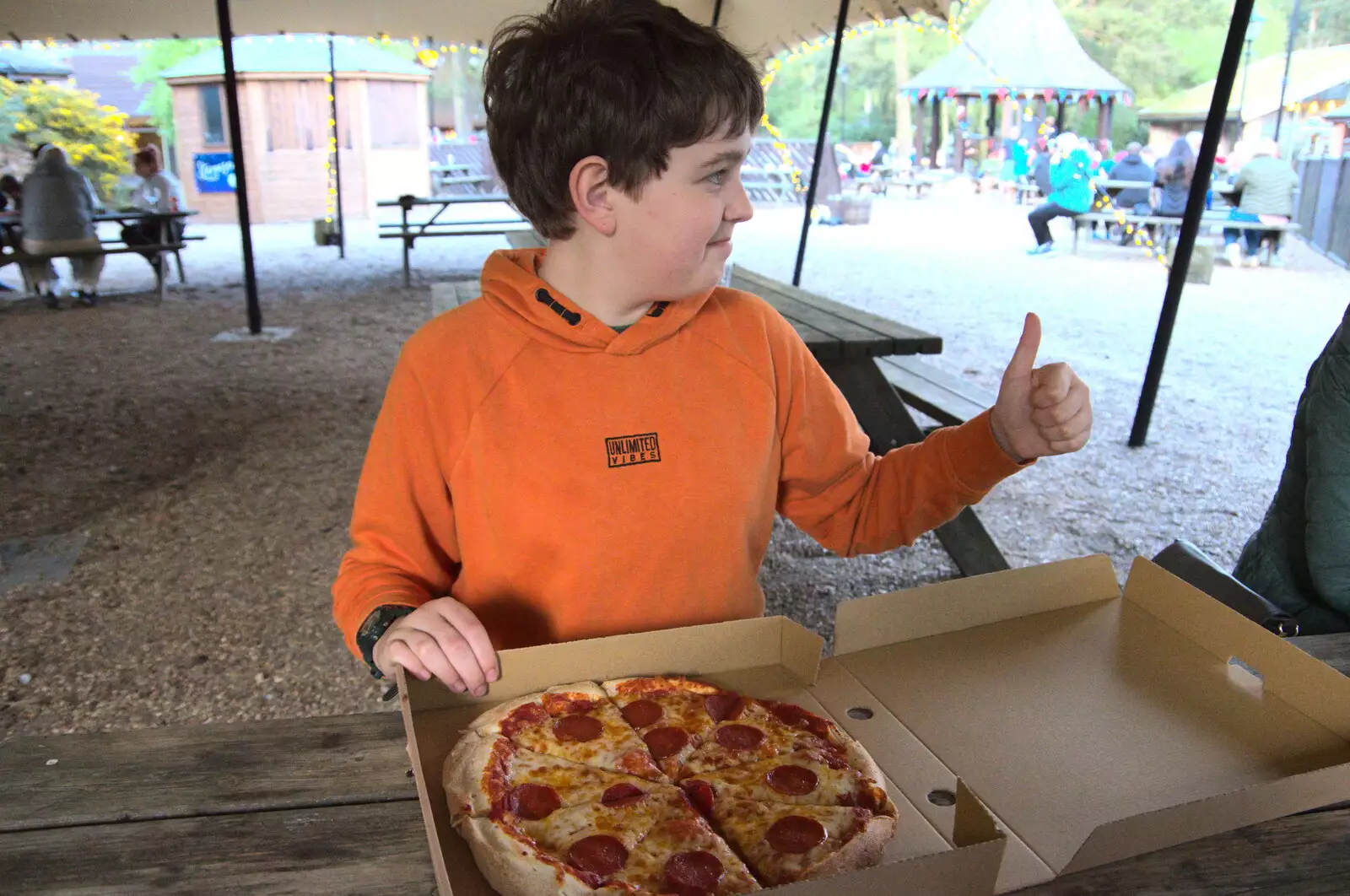 Fred gives the pizza a thumbs-up, from A Coronation Camping Picnic, Kelling Heath, Norfolk - 6th May 2023