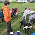 Tilly Dog roams around with her favourite toy, A Coronation Camping Picnic, Kelling Heath, Norfolk - 6th May 2023