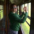 Isobel takes a phone-photo through the window, A Coronation Camping Picnic, Kelling Heath, Norfolk - 6th May 2023
