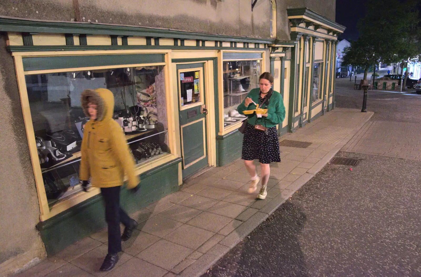 Isobel scoffs a tub of cheesy chips, from DesignerMakers' Fund-Raising Ceilidh, The Cornhall, Diss - 13th May 2023