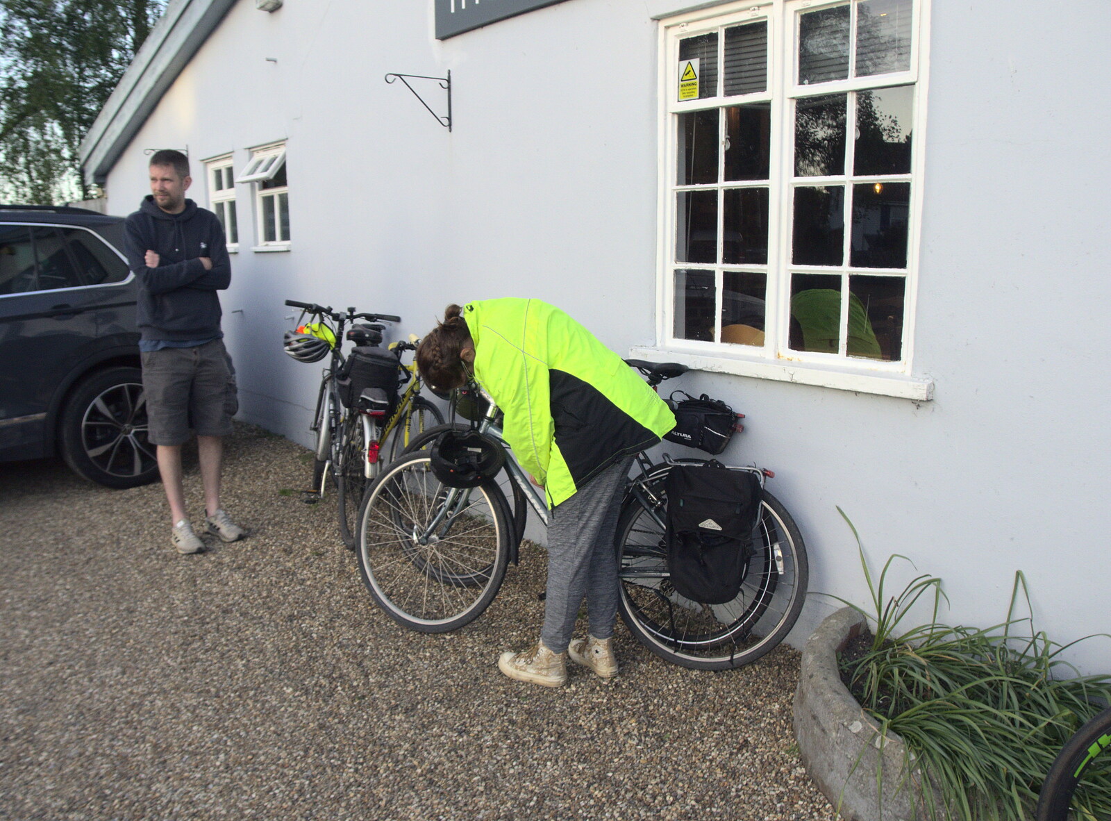 Isobel unlocks her bike from The BSCC at Rushall, South Lopham and Redgrave - 25th May 2023