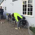 Isobel unlocks her bike, The BSCC at Rushall, South Lopham and Redgrave - 25th May 2023