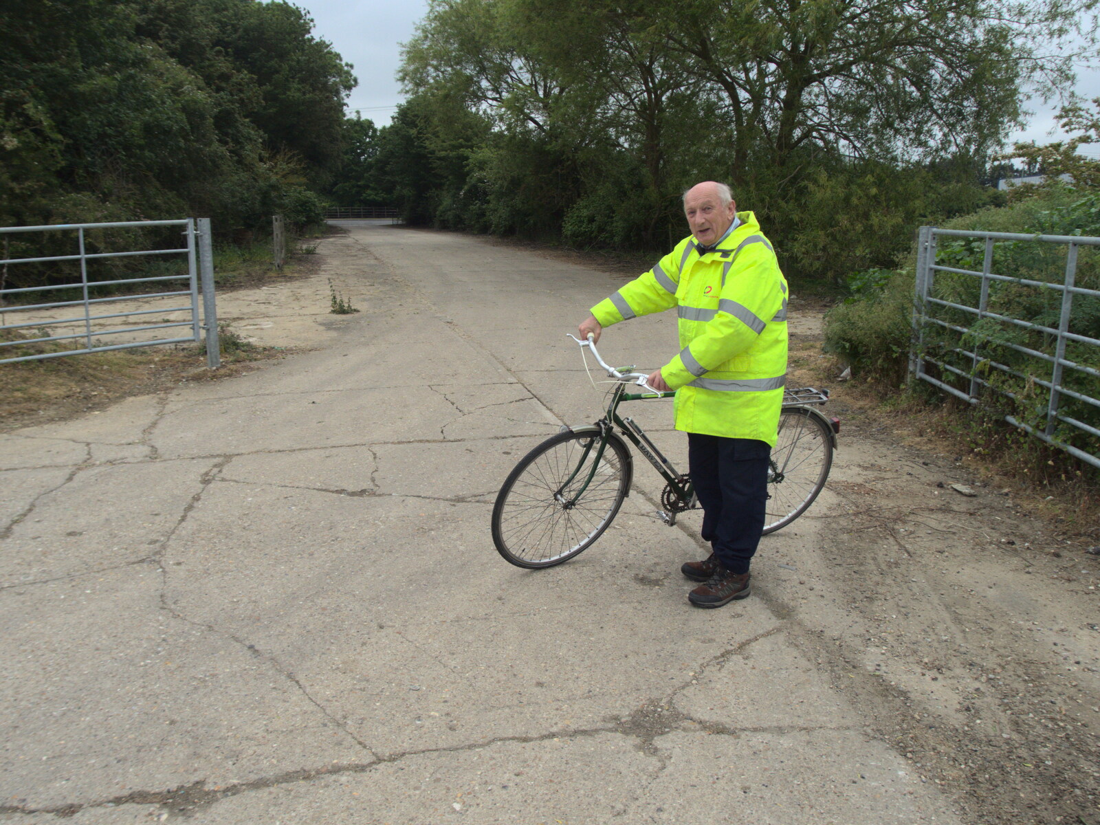 Mick readies his bike for a trip to the Railway from A Quest for the Fabled Swimming Spot, Hoxne, Suffolk - 29th May 2023
