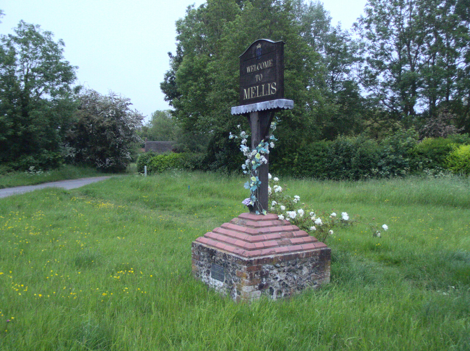 Flowers around the village sign from A Quest for the Fabled Swimming Spot, Hoxne, Suffolk - 29th May 2023