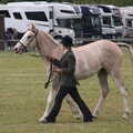 A horse gets a walk around a show ring, The Suffolk Youth Wind Orchestra at the Suffolk Show, Trinity Park - 1st June 2023