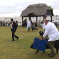 The judge roams around looking at pigs, The Suffolk Youth Wind Orchestra at the Suffolk Show, Trinity Park - 1st June 2023
