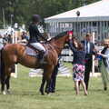 The horse gets a winner's rosette, The Suffolk Youth Wind Orchestra at the Suffolk Show, Trinity Park - 1st June 2023
