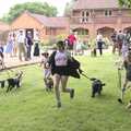 An egg and spoon and dog race occurs, BSCC Rides and the Village Fete, Brome, Suffolk - 8th July 2023