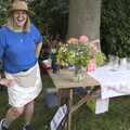 Sarah with her flower arrangement, BSCC Rides and the Village Fete, Brome, Suffolk - 8th July 2023