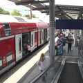 The train stops at Düsseldorf Flughaven station, A Walk To The Rheinturm, Düsseldorf, Germany - 29th July 2023
