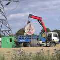Meanwhile, a spare cable reel is loaded onto a lorry, National Grid Pylon Upgrades, Thrandeston, Suffolk - 30th July 2023