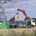 Meanwhile, a spare cable reel is loaded onto a lorry, National Grid Pylon Upgrades, Thrandeston, Suffolk - 30th July 2023