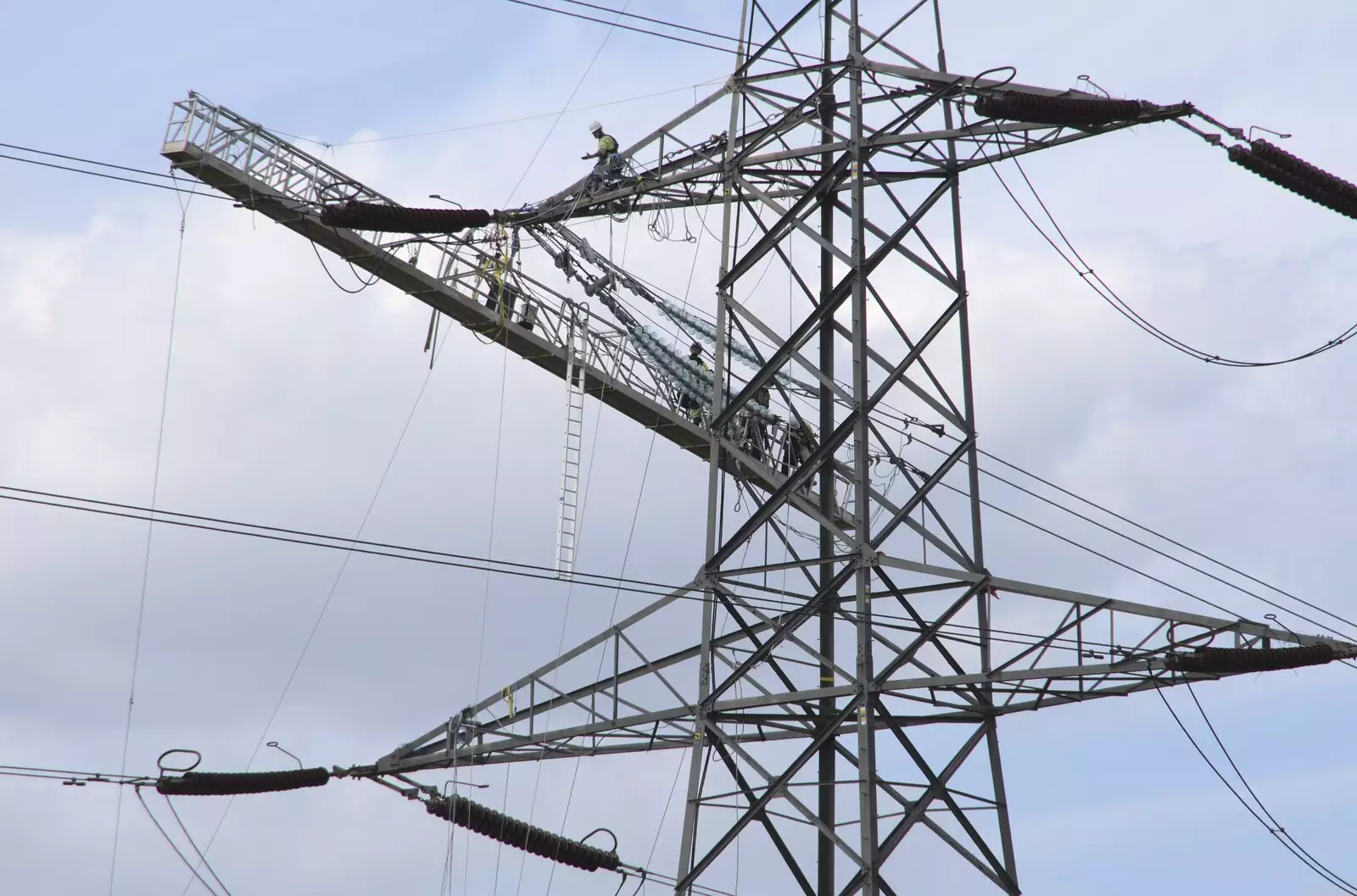 Working at great height on a live pylon, from National Grid Pylon Upgrades, Thrandeston, Suffolk - 30th July 2023